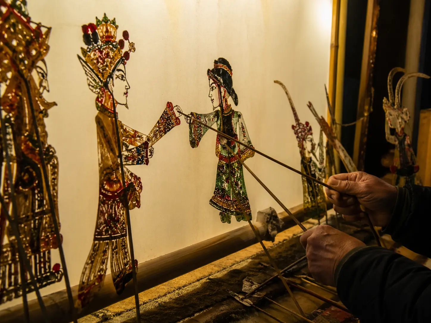 Chinese shadow puppetry figures as a traditional folk storytelling craft